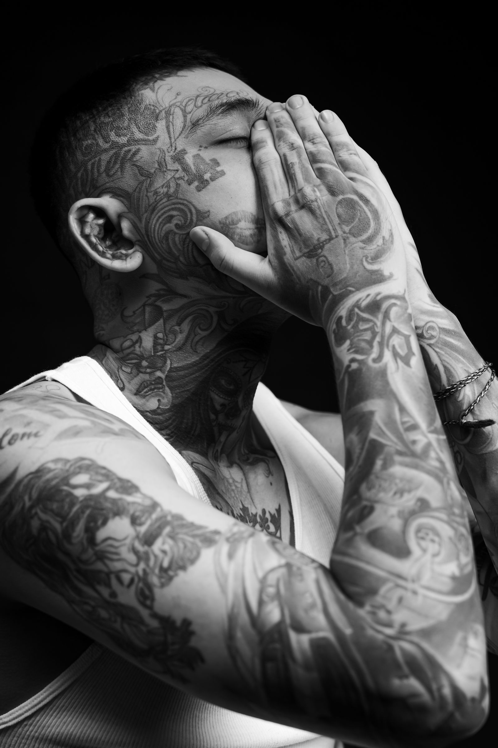 Black and grey portrait tattoo